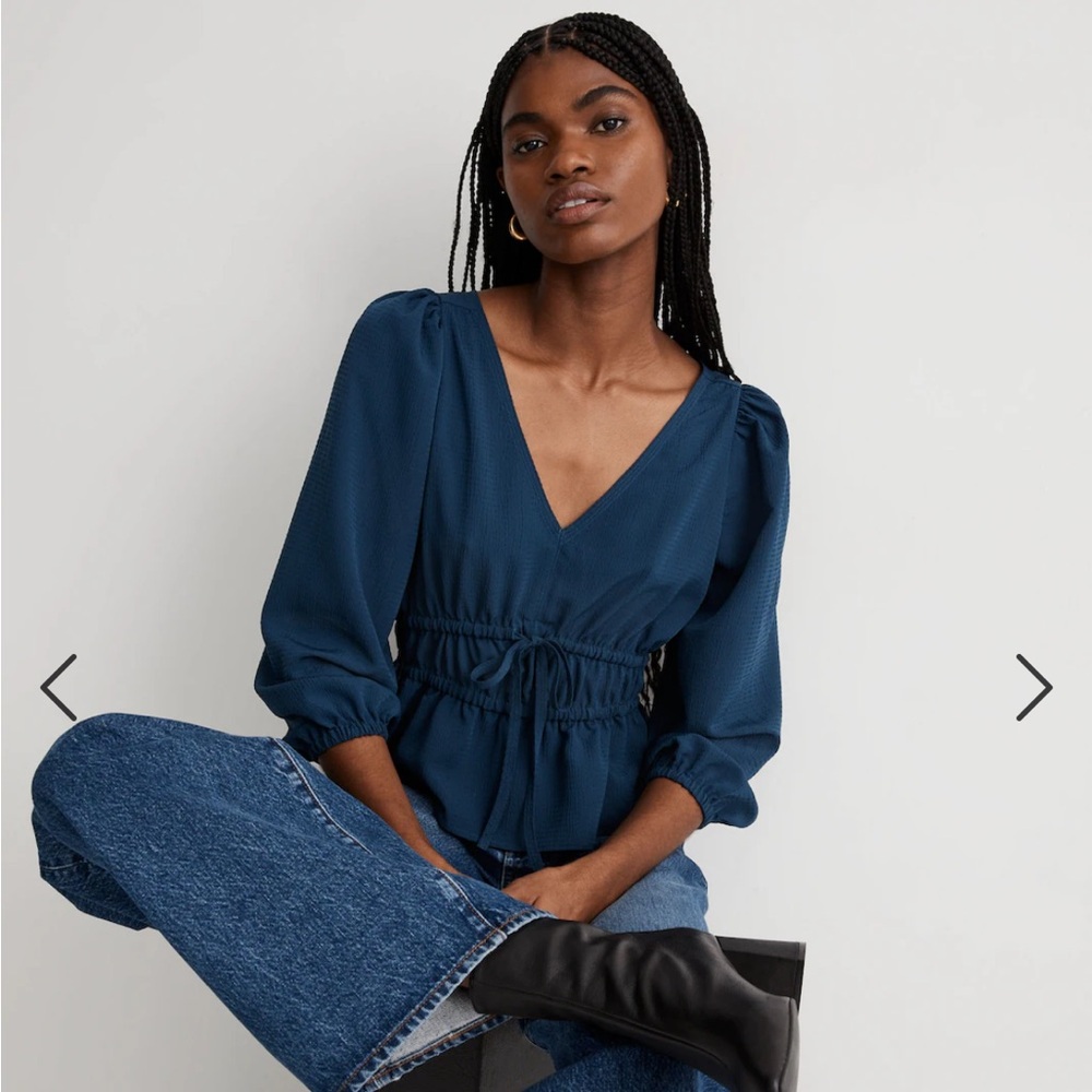 Seersucker V-Neck Peplum Top